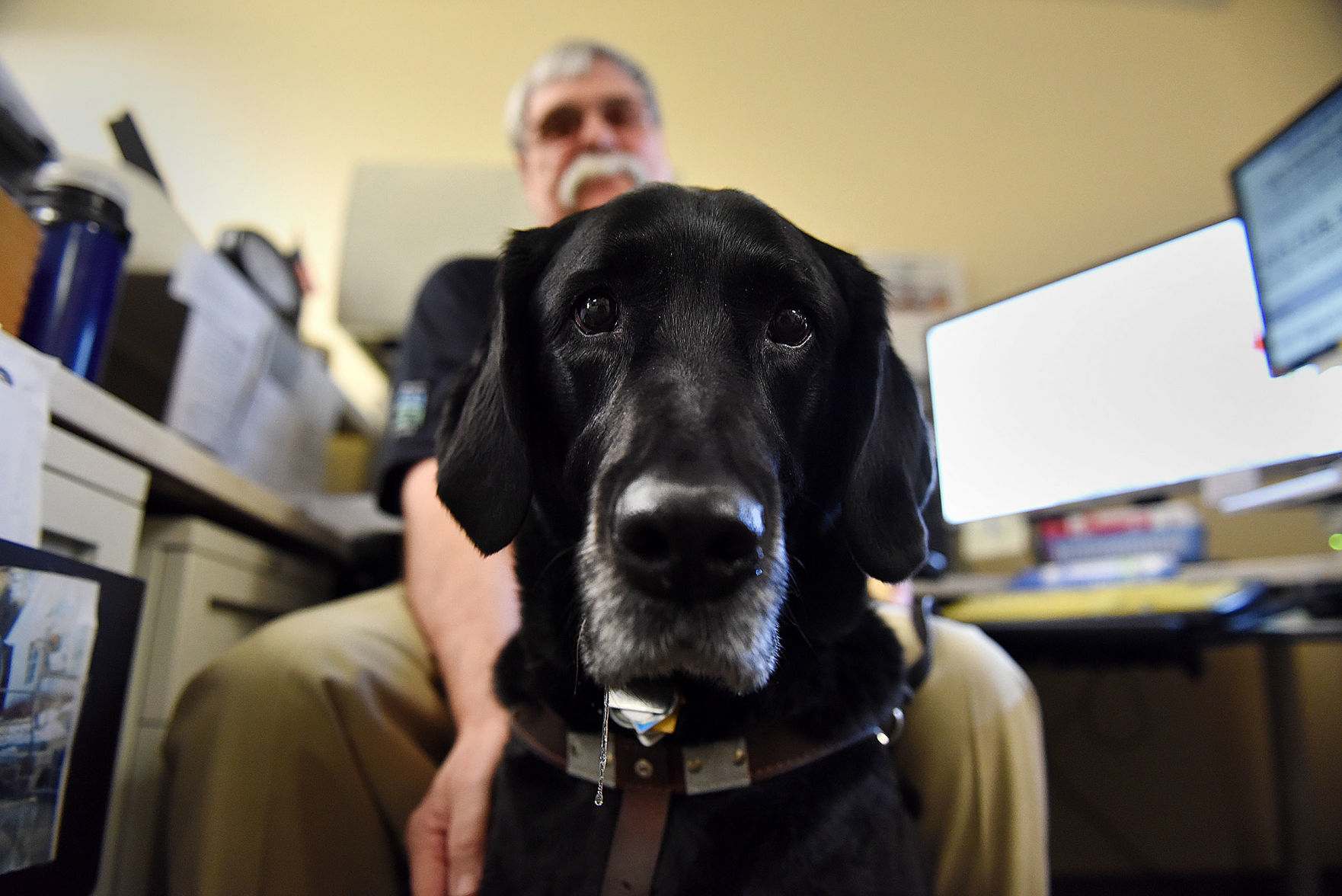Larry Ashford and seeing-eye dog Quentin